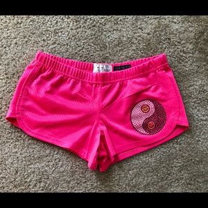 Denny’s got pink yin yang mesh shorts